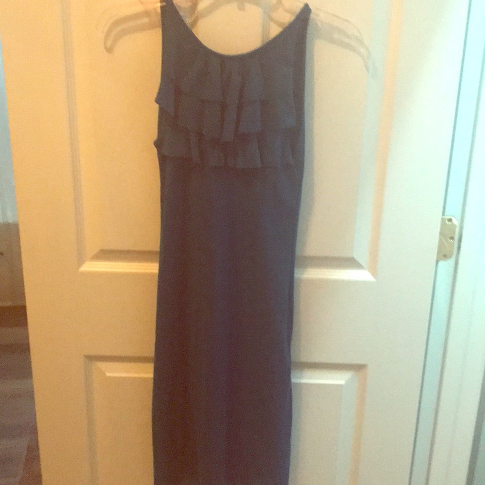 Teal dress with ruffled top.